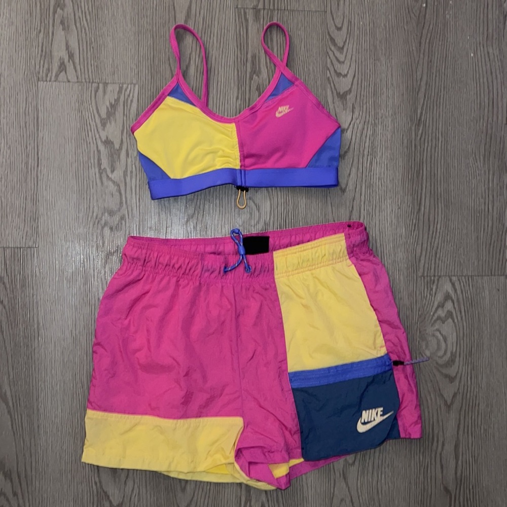 Nike Icon Clash Indy Toggle bra & short set in colorbock pink